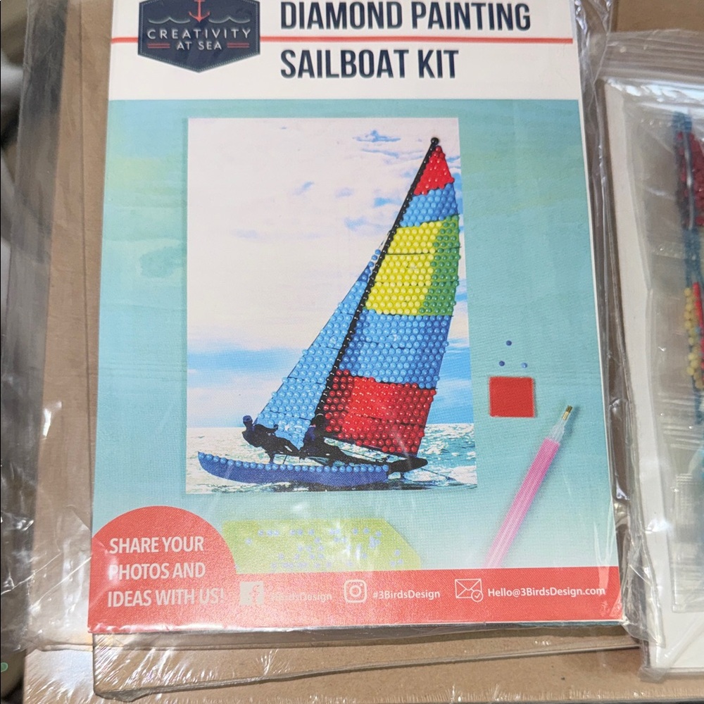 "Creativity at Sea" diamond painting kit featuring a sailboat design.